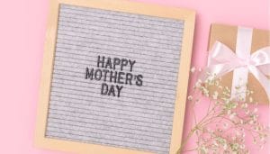 Press board with letters spelling out 